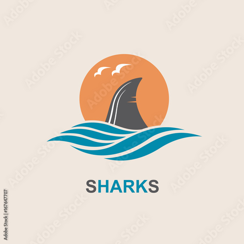 icon of angry shark fin with sea waves