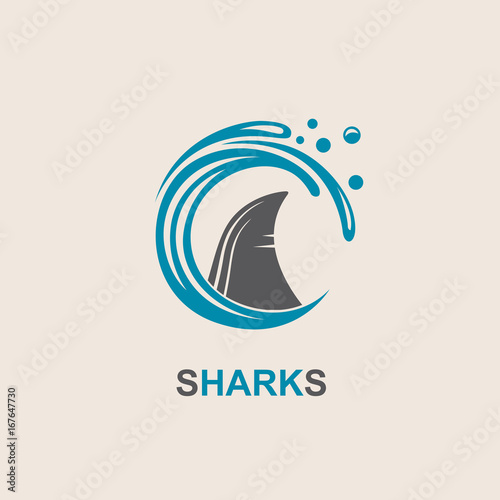 icon of angry shark fin with sea waves