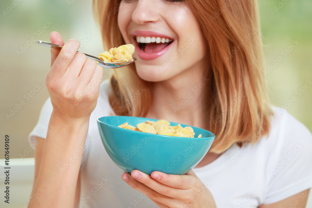 Young pretty woman having breakfast, closeup Young pretty woman having breakfast, closeup