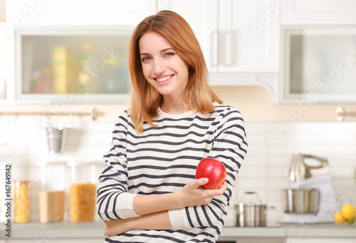 Young woman holding delicio...