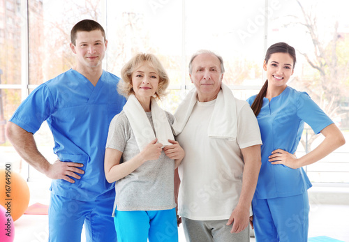 Physiotherapists with elder...