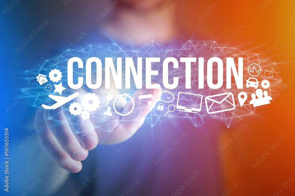 Concept of man holding a futuristic interface with connection title and multimedia icons flying all around - Internet concept Concept of man holding a futuristic interface with connection title and multimedia icons flying all around - Internet concept