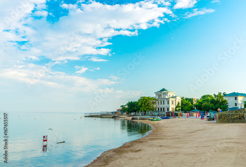 A beach and a sandy beach in the evening in Evpatoria, in Crimea