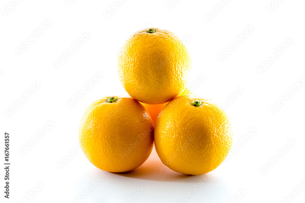 Four orange isolated on white background. Tropical fruit. Front view Four orange isolated on white background. Tropical fruit. Front view