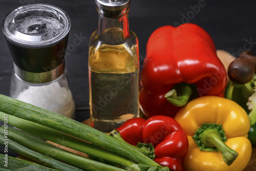Ingredients for salad on the table, vegetables, salt, oil