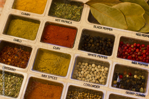 Spices, kitchen herbs and flavoring photo