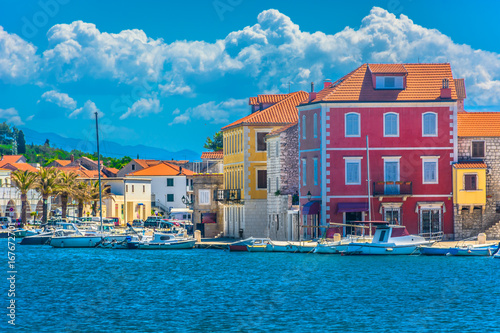 Hvar Croatia. / Seafront view at mediterranean town Starigrad, famous travel harbor on island Hvar, Croatia. photo