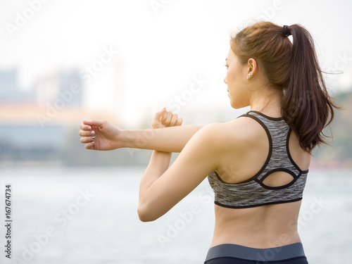 Woman fitness outdoor concept, young asian beautiful woman/sport girl running walking and yoga at outdoor park with fresh, relax, happy feeling.