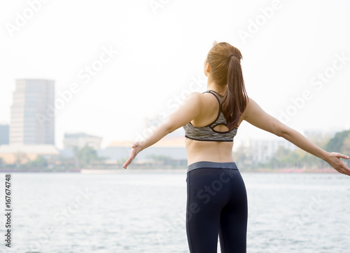 Woman fitness outdoor concept  young asian beautiful woman sport girl running walking and yoga at outdoor park with fresh  relax  happy feeling.