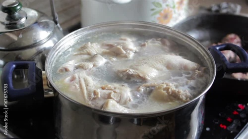 On a plate of chicken broth/Cooking broth in the kitchen