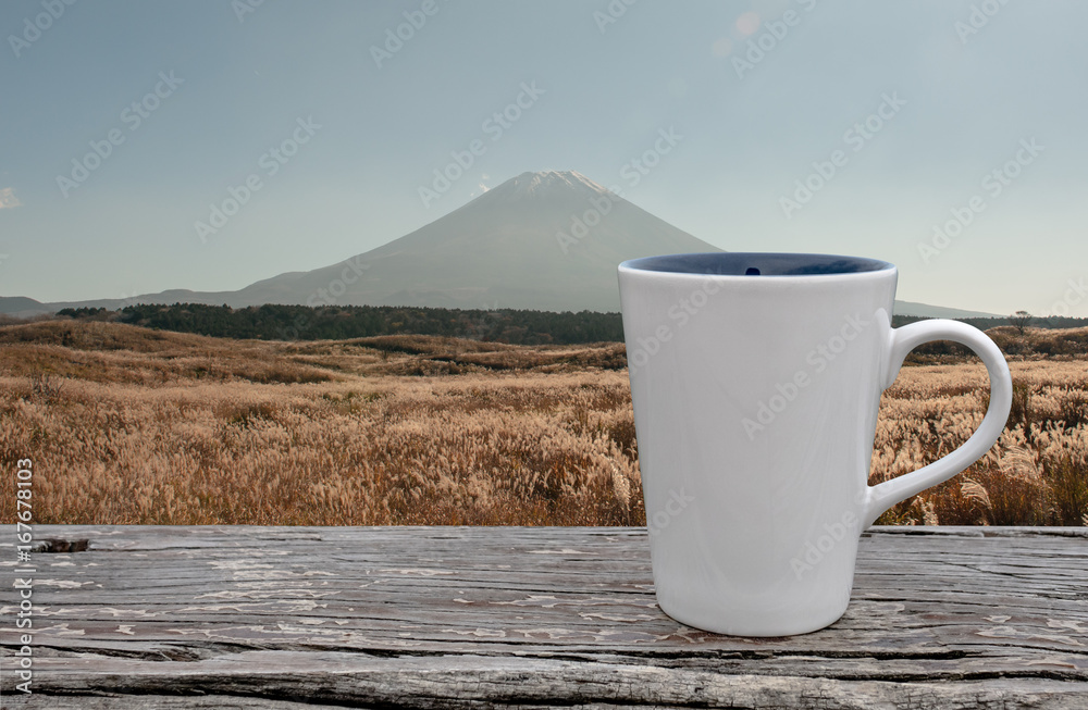 Obraz premium cup of coffee on abstract nature background