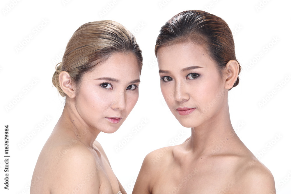 Two Asian women with beautiful fashion make up wrapped hair Two Asian women with beautiful fashion make up wrapped hair
