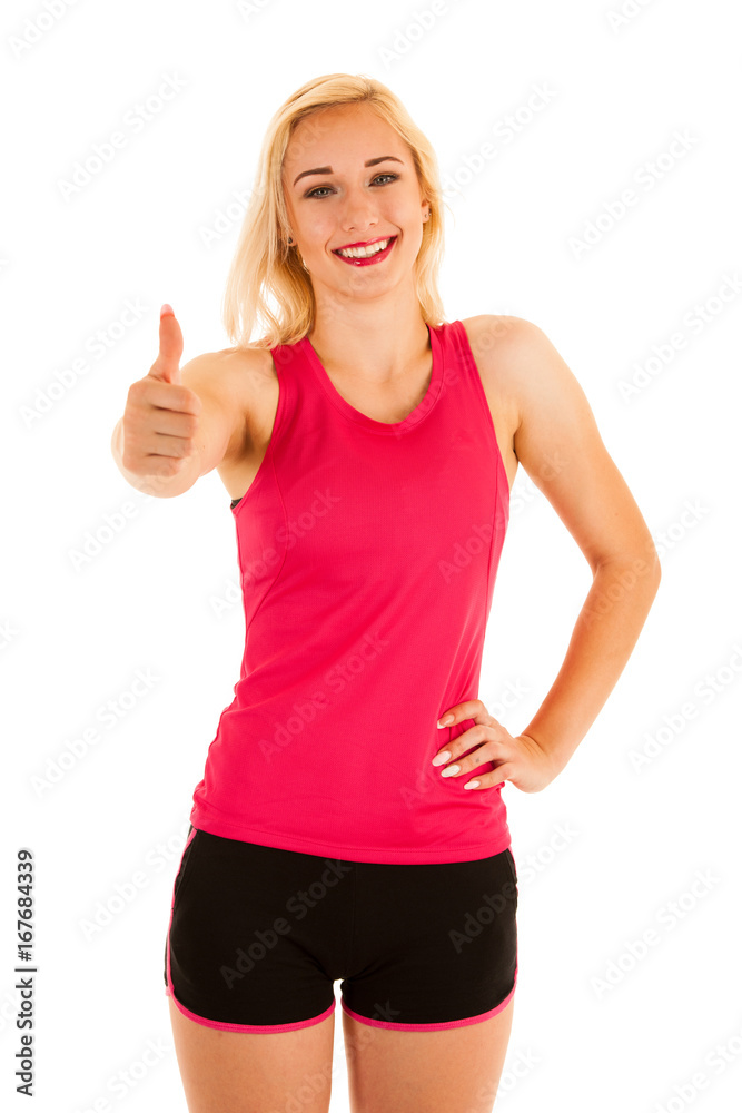 Active blonde sporty woman shows thumb up as a gesture for success Active blonde sporty woman shows thumb up as a gesture for success
