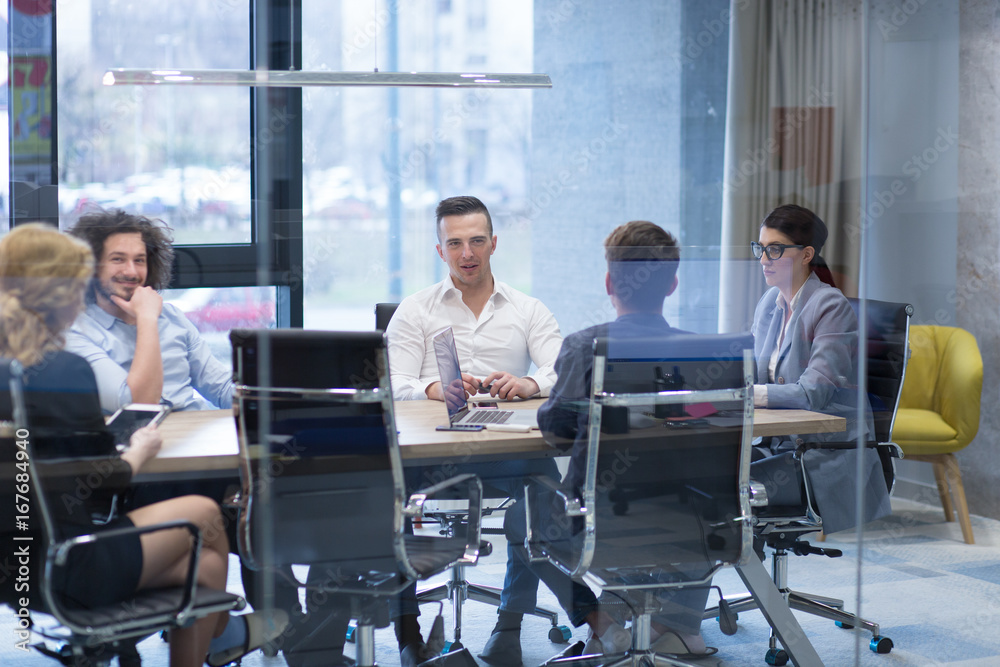 Startup Business Team At A Meeting at modern office building