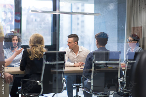 Startup Business Team At A Meeting at modern office building