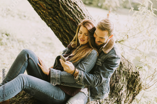 Couple in love sitting on a...