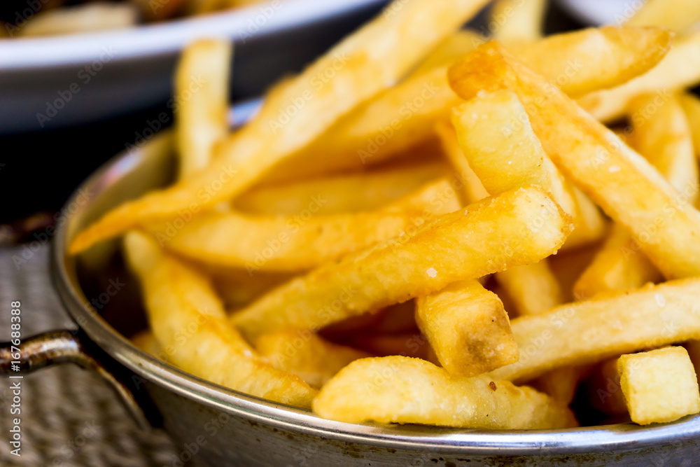 Golden French fries potatoes ready to be eaten Golden French fries potatoes ready to be eaten
