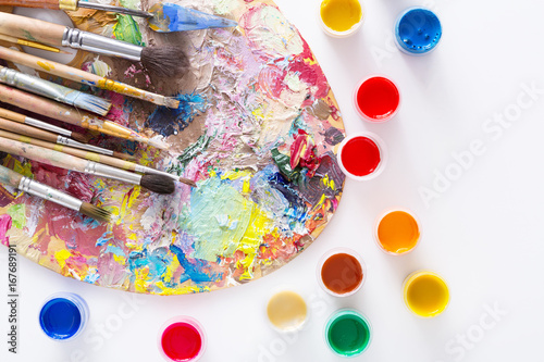 Art palette with colorful paint strokes, isolated