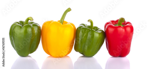 Fresh vegetables Three sweet Red, Yellow, Green Peppers isolated on white background.
