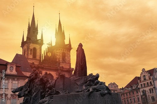 Church of Our Lady Tyn and Jan Hus statue from Old Town Square Staromestska Prague at sunset. Prague landmarks.