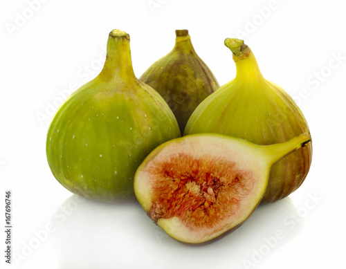 Fresh figs. Fruit with half and quarter isolated on white background.