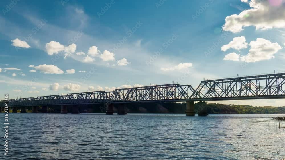 railway bridge across the river which involves trains. Timelapse railway bridge across the river which involves trains. Timelapse