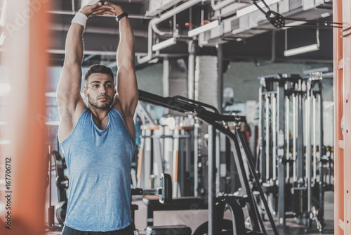 Serene unshaven man engaging in athletics