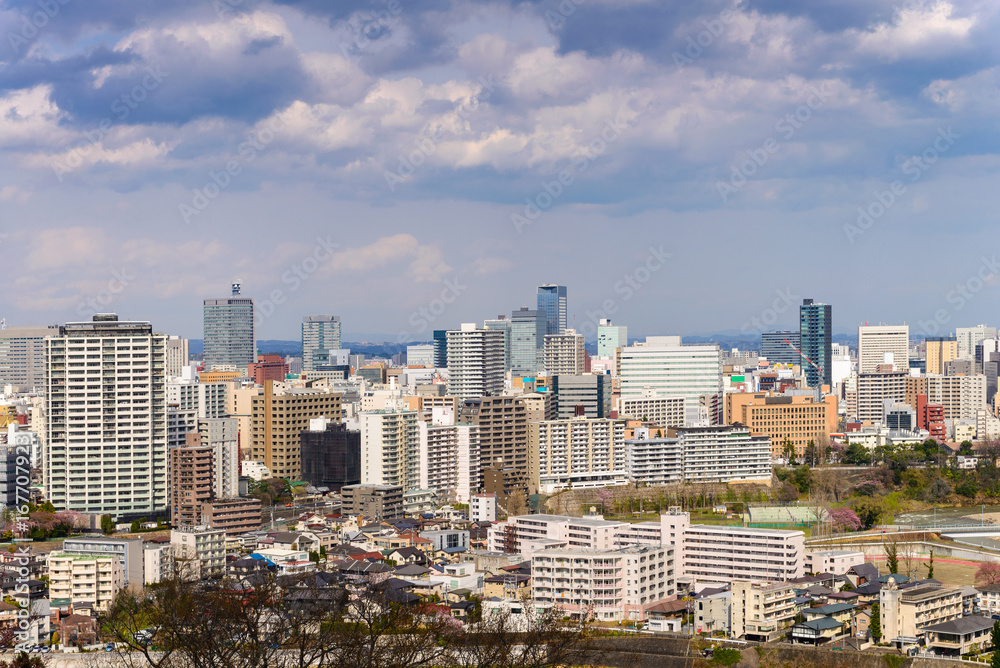 Cityscape of miyagi city. aerial view of skyscraper,  office building and downtown of sendia with blue sky background. Japan, Asia