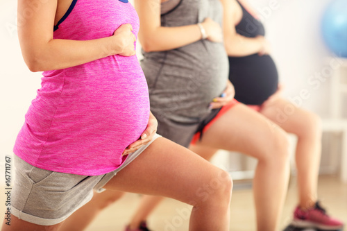 Fototapeta Naklejka Na Ścianę i Meble -  Group of pregnant women during fitness class