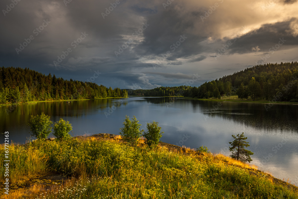 Landscape: sunset after the rain on Ladoga lake.