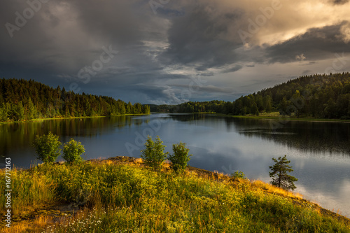 Fototapeta Naklejka Na Ścianę i Meble -  Landscape: sunset after the rain on Ladoga lake.