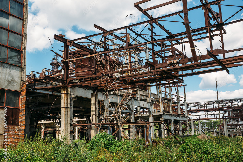 Abandoned industrial area, rusty steel and concrete constructions