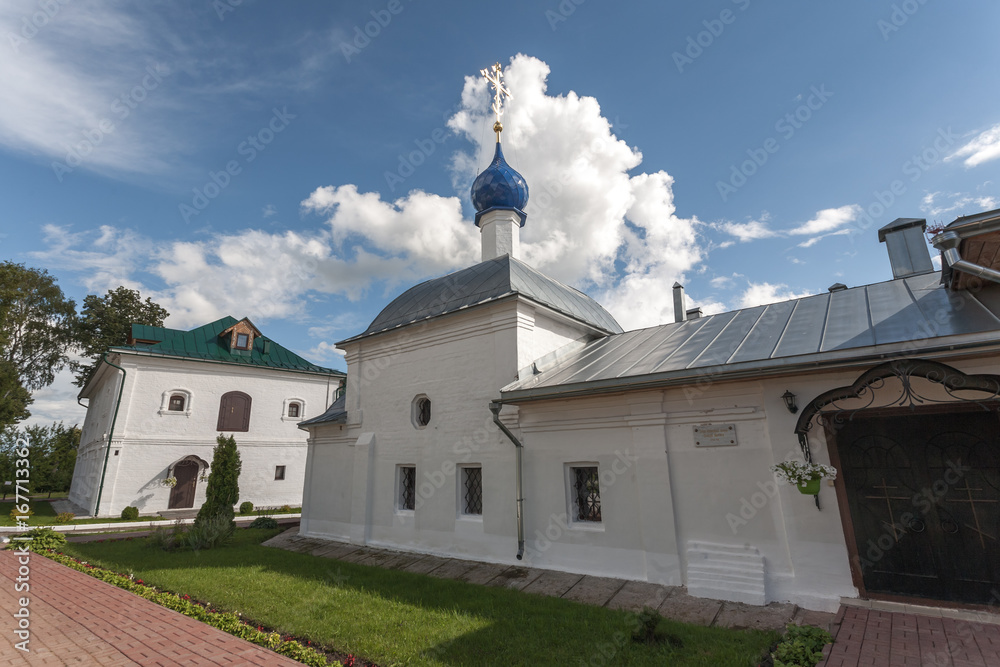 dome of orthodox Christian church against the background of the blue sky and white clouds