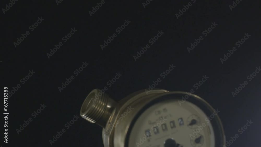 Closeup Motion down to Old Useful Home Water Meter Closeup Motion down to Old Useful Home Water Meter