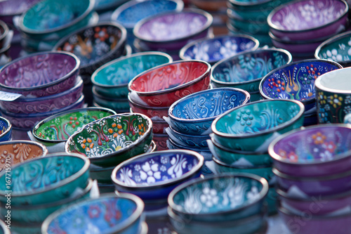 Many beautiful multi-colored ceramic pial painted in oriental style © guppys