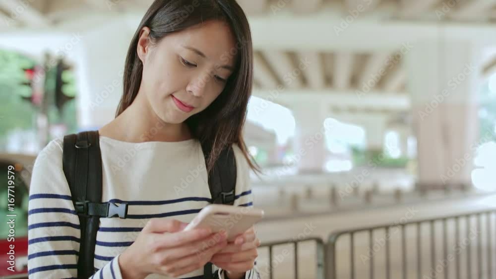 Woman searching something on cellphone Woman searching something on cellphone