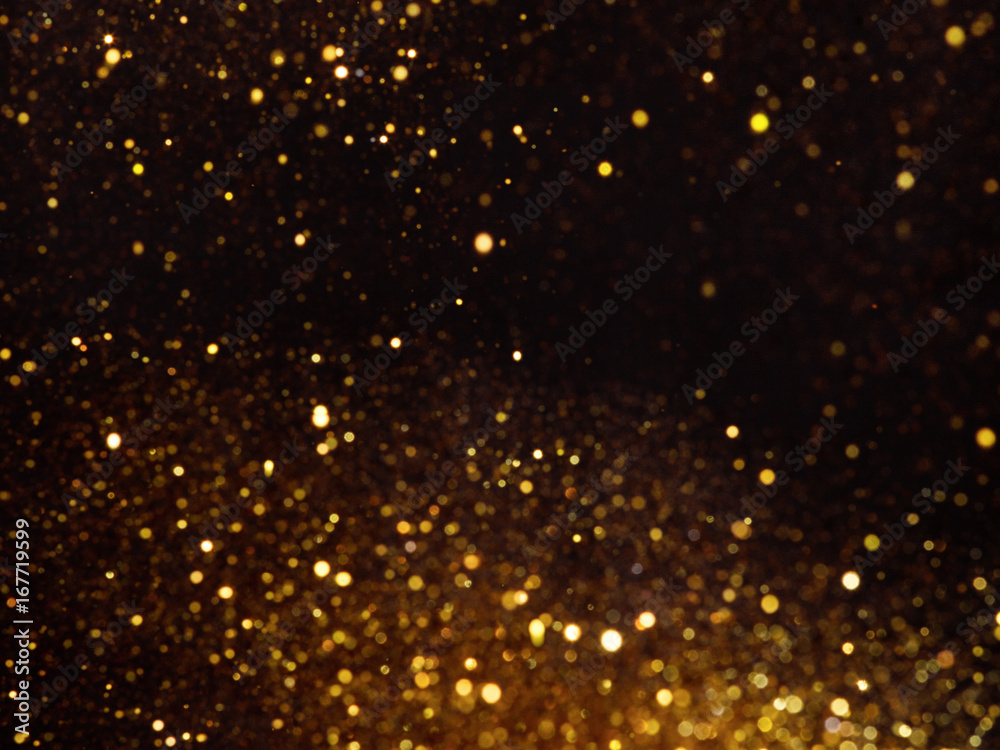 Golden overlay background of golden lights with bokeh effect.