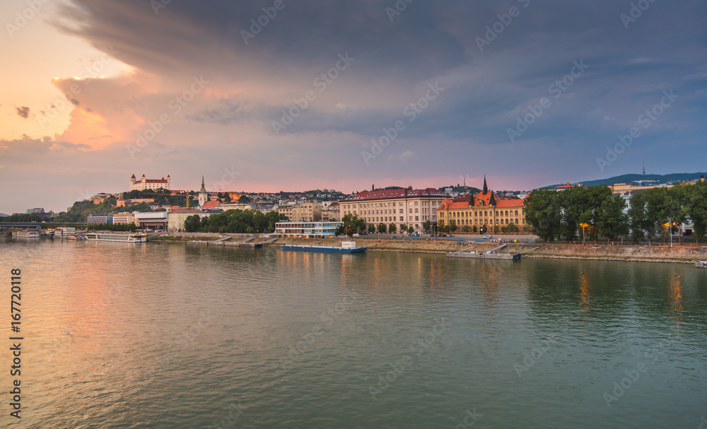 Cityscape of Bratislava, Slovakia at Sunset  as Seen from a Bridge over Danube River Towards Old Town of Bratislava.