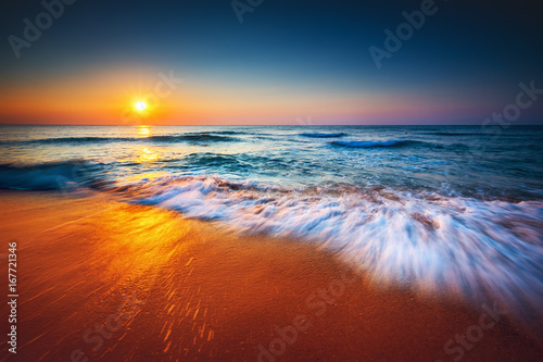Fototapeta Naklejka Na Ścianę i Meble -  Beautiful sunrise over the sea