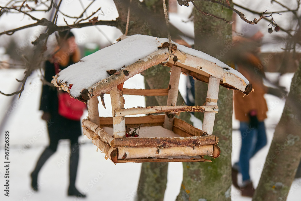 Naklejka premium Birdhouse at winter