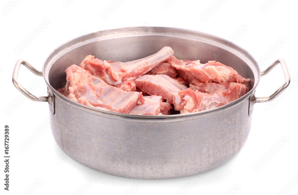 Raw pork with fat marinated in a stainless pot isolated on white background