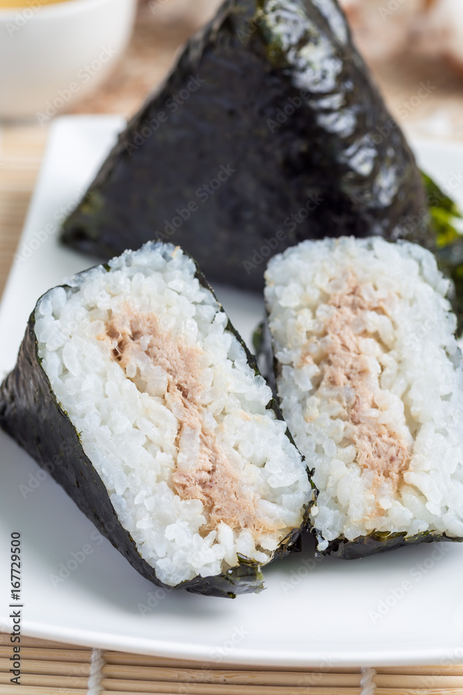 Korean triangle kimbap Samgak with nori, rice and tuna fish, similar to