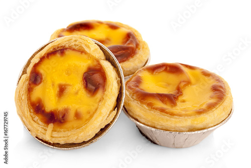 Egg tart sweet custard pie in foil cup isolated on white background