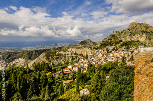 PANORAMIC CITY OF TAORMINA AND MOUNTAINS FROM GREEK THEATER