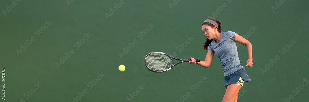 Tennis player Asian woman playing hitting ball on court banner. Copy space panorama crop on green background.
