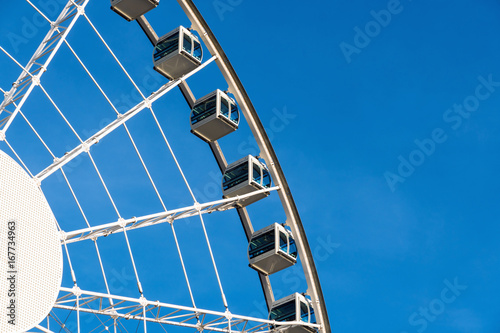 Photography Closeup part of ferris wheel over the blur sky