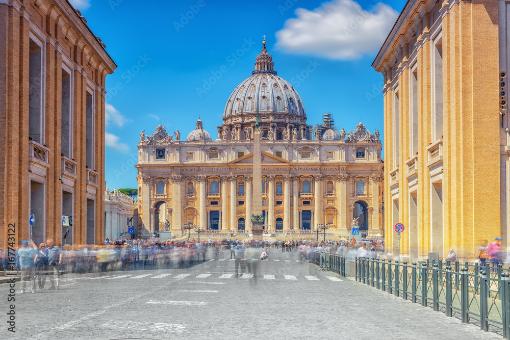 St. Peter's Square and St. Peter's Basilica, Vatican City in the evening time from street of the Conciliation (Via della Conciliazione). Italy.