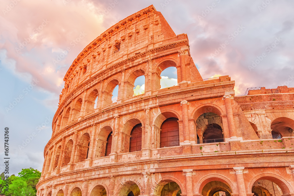 Beautiful landscape of the Colosseum in Rome- one of wonders of the world  in the evening time.
