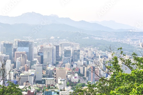 Beautiful Scenery of Downtown Seoul with Mountain Range in the Background