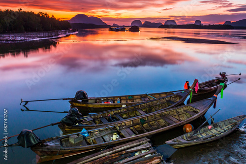 Photography Fishing boat in the golden morning light.
